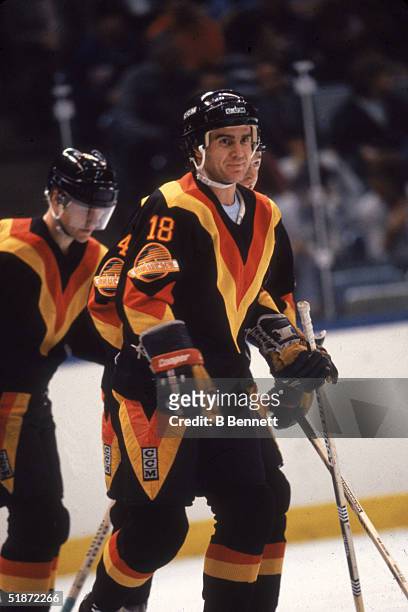 Canadian professional ice hockey player Darcy Rota forward of the Vancouver Canucks on the ice against the New York Islanders, Nassau Coliseum,...