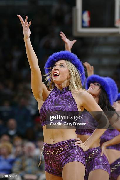 Energee! the Milwaukee Bucks cheerleaders perform during the game against the San Antonio Spurs on December 4, 2004 at the Bradley Center in...