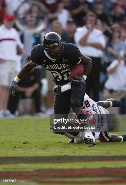 Wide receiver Troy Williamson of the South Carolina Gamecocks runs upfield against cornerback Tim Jennings and the Georgia Bulldogs during their game...