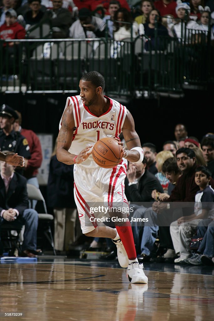 T Mac Rockets Tracy McGrady of the Houston Rockets moves the ball during the game ...