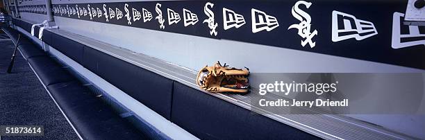 Panoramic view of a baseball glove in the dugout bench at U.S. Cellular Field as the Chicago White Sox host the Cleveland Indians on August 1, 2003...