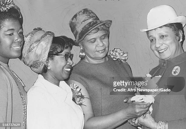African-American actress and singer Etta Moten Barnett and members of the Alpha Kappa Alpha sorority at Ben Franklin Hotel, Philadelphia,...