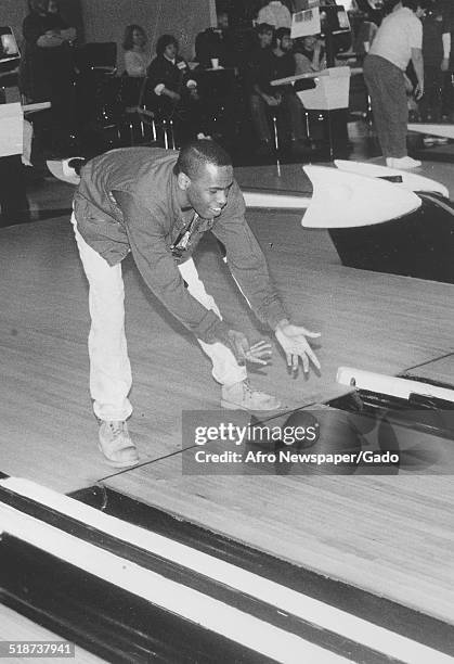 Athlete bowling during the Special Olympics, Maryland, 1995.