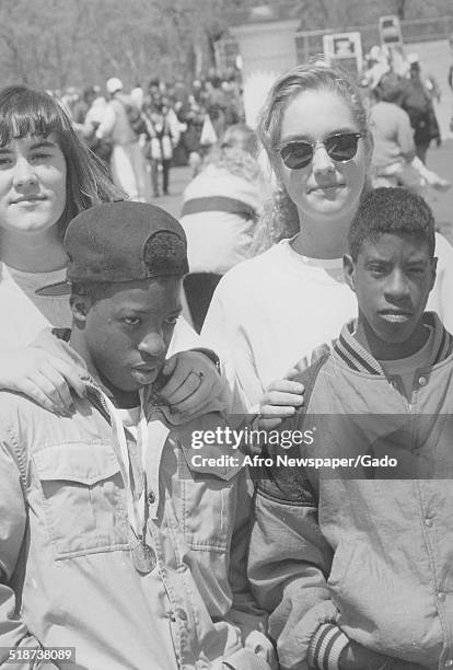 Athletes and volunteer during the Special Olympics, Maryland, 1995.