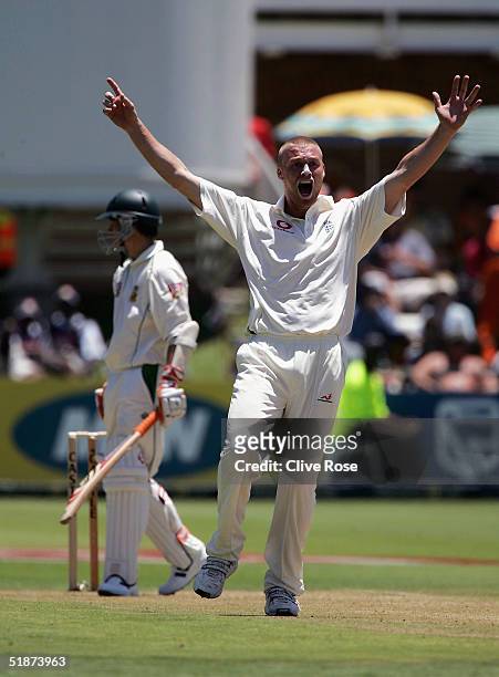 Andrew Flintoff of England succesfully appeals the wicket of AB de Villiers during day one of the first Test Match between South Africa and England...