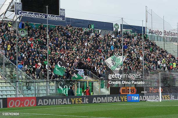 Sassuolo fans shows their support during the Serie A match between Carpi FC and US Sassuolo Calcio at Alberto Braglia Stadium on April 2, 2016 in...