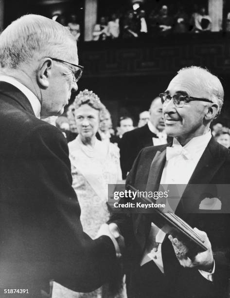 Scientist George Wald receives the 1967 Nobel Prize in Medicine from King Gustav Adolf of Sweden at the Stockholm Concert Hall, 10th December 1967....