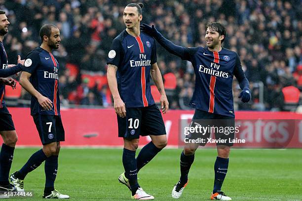 Zlatan Ibrahimovic of Paris Saint-Germain celebrate his first goal with Maxwell and teammates during the French Ligue 1 match between Paris...