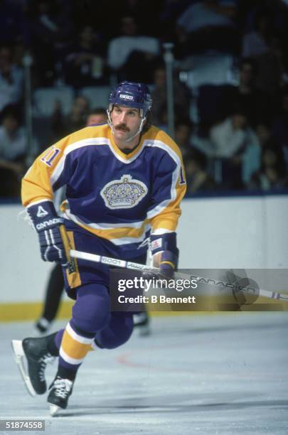 Canadian hockey player Charlie Simmer of the Los Angeles Kings on the ice during a game against the New York Islanders at Nassau Coliseum, Uniondale,...