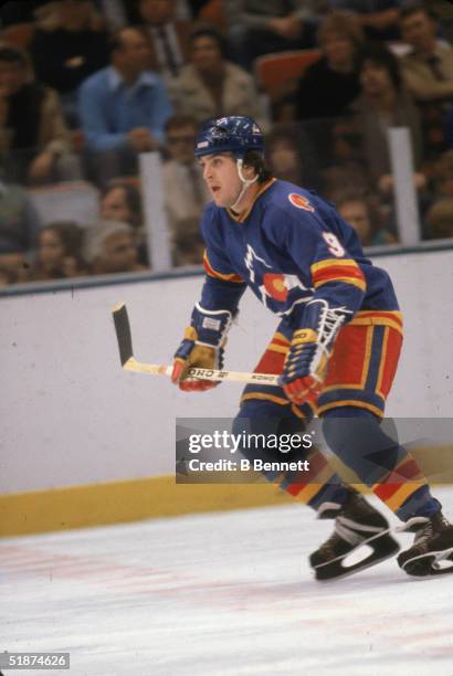 Canadian hockey player Wilf Paiement of the Colorado Rockies skates on the ice during a game against the New York Islanders at Nassau Coliseum,...