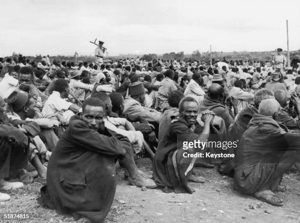 Some of the 6,000 Africans rounded up in Kairobangi, Nairobi, by police searching for Mau Mau suspects, 27th April 1953.