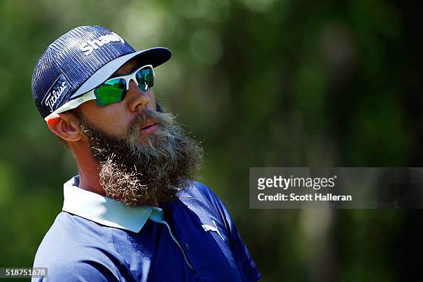Graham DeLaet of Canada watches his tee shot on the sixth hole during the third round of the Shell Houston Open at the Golf Club of Houston on April...