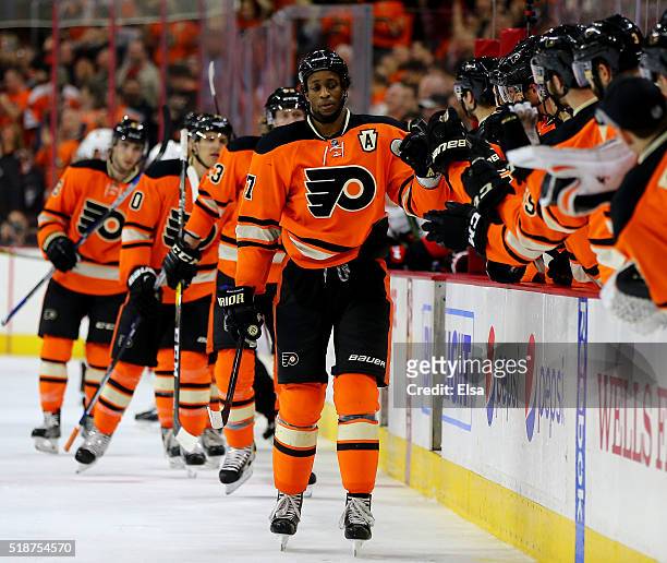 Wayne Simmonds of the Philadelphia Flyers celebrates his goal with teammates on the bench in the third period against the Ottawa Senators at the...