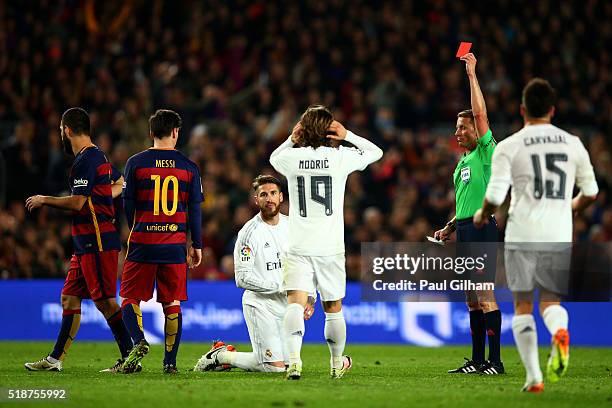 Sergio Ramos of Real Madrid CF receives a red card from referee Alejandro Jose Hernandez Hernandez during the La Liga match between FC Barcelona and...