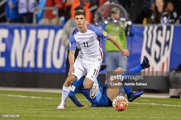 Christian Pulisic of the United States Men's National Team controls the ball against Guatemala during the FIFA 2018 World Cup qualifier on March 29,...