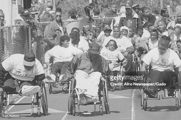 Athletes, with wheelchair, during the Special Olympics, Maryland, 1995.