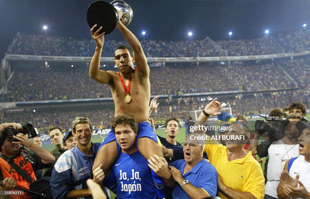 Carlos Tevez of Boca Juniors displays th