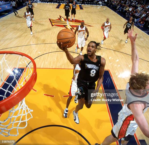 Latrell Sprewell of the Minnesota Timberwolves shoots during the NBA game against the Golden State Warriors at The Arena in Oakland on December 1,...