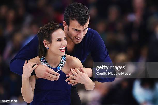 Meagan Duhamel and Eric Radford of Canada celebrate after completing their routine in the Pairs Free Skate on Day 6 of the ISU World Figure Skating...