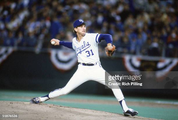 Pitcher Bret Saberhagen of the Kansas City Royals delivers a pitch to a St. Louis Cardinals batter during Game Seven of the 1985 World Series at...