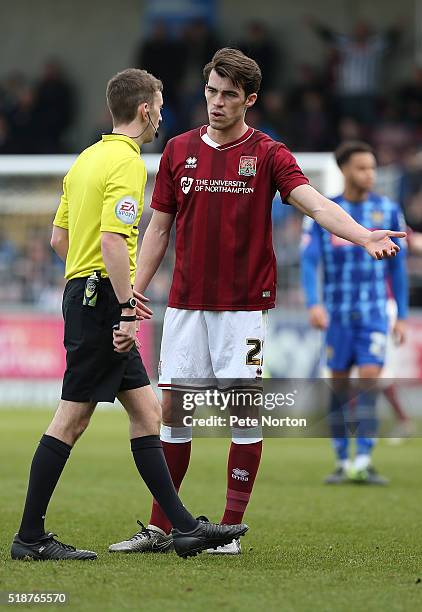 John Marquis of Northampton Town makes a point to referee Ben Toner during the Sky Bet League Two match between Northampton Town and Notts County at...