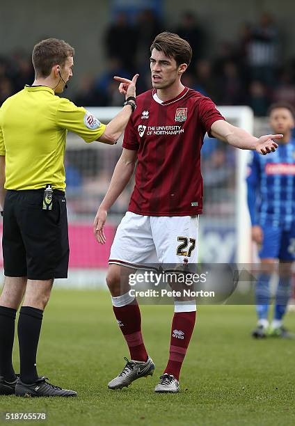 John Marquis of Northampton Town makes a point to referee Ben Toner during the Sky Bet League Two match between Northampton Town and Notts County at...