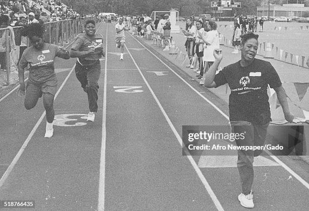 Track and field athletes during the Special Olympics, Maryland, 1995.