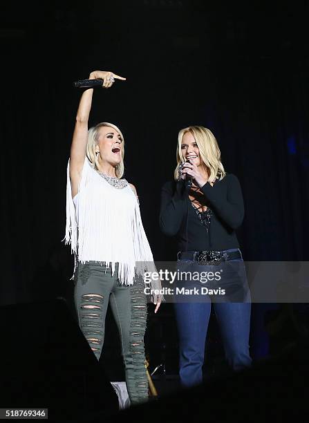 Singers Carrie Underwood and Miranda Lambert perform onstage at the 4th ACM Party for a Cause Festival at the Las Vegas Festival Grounds on April 1,...