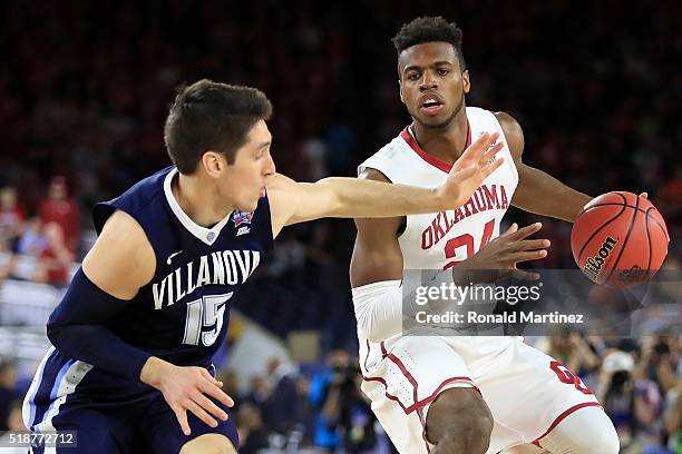 Buddy Hield of the Oklahoma Sooners handles the ball against Ryan Arcidiacono of the Villanova Wildcats in the first half during the NCAA Men's Final...