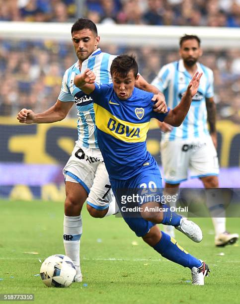 Adrian Cubas of Boca Juniors fights for the ball with Agustin Diaz of Rafaela during a match between Boca Juniors and Atletico Rafaela as part of 9th...