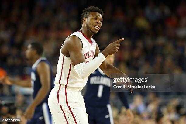 Buddy Hield of the Oklahoma Sooners reacts in the first half against the Villanova Wildcats during the NCAA Men's Final Four Semifinal at NRG Stadium...