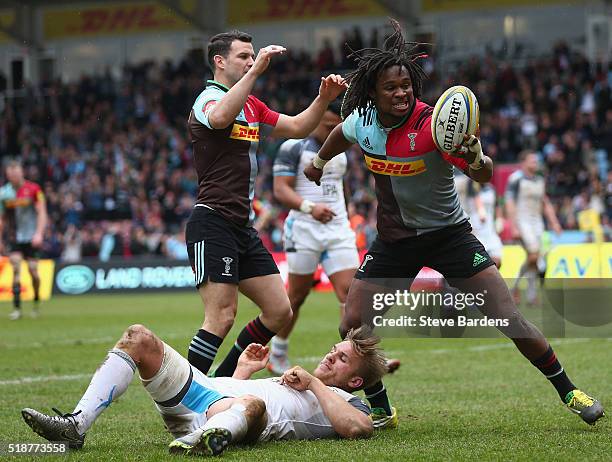 Marland Yarde of Harlequins celebrates scoring a try during the Aviva Premiership match between Harlequins and Newcastle Falcons at Twickenham Stoop...