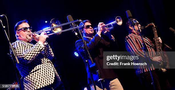 Joe Lindsay aka Hopepa, Toby Laing aka Tony Chang and Scott Towers aka Chopper Reedz of Fat Freddys Drop perform live during a concert at the...