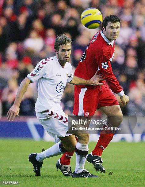Olof Mellberg of Aston Villa battles with Mark Viduka of Middlesbrough during the FA Barclays Premiership match between Middlesbrough and Aston Villa...