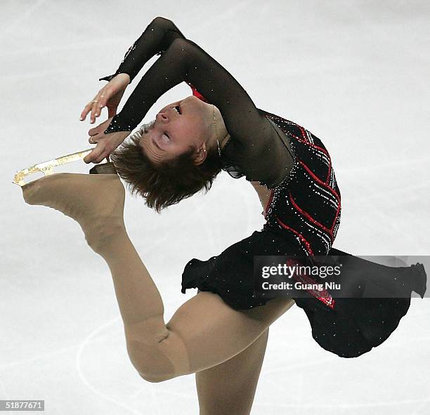 Irina Slutskaya of Russia performs at the 2004/2005 ISU Grand Prix of Figure Skating Final on December 18, 2004 in Beijing, China. Slutskaya won the...