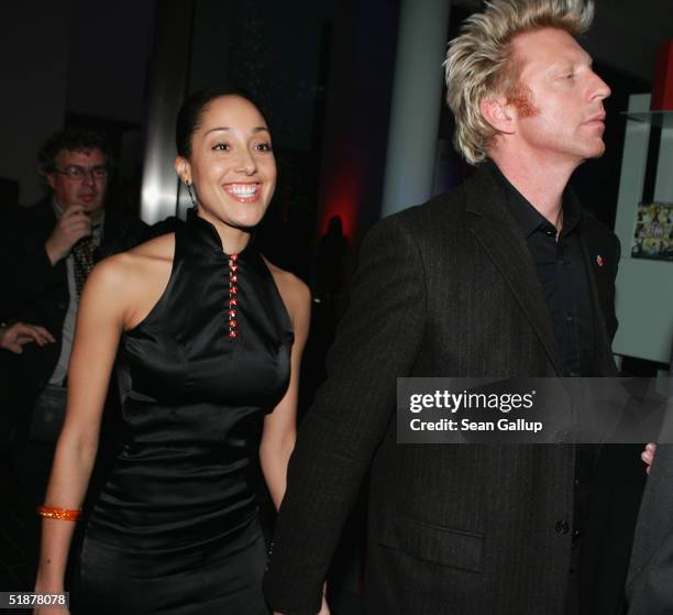 Boris Becker and his girlfriend Caroline Rocher attend the "Ein Herz Fuer Kinder" Gala at The Axel Springer building on December 18, 2004 in Berlin,...