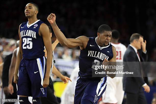 Kris Jenkins of the Villanova Wildcats reacts in the second half against the Oklahoma Sooners as Mikal Bridges looks on during the NCAA Men's Final...