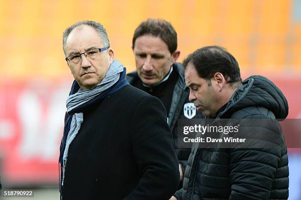 President of Angers Said Chabane and Angers assistant coach Serge Le Dizet and Angers coach Stephane Moulin during the French Ligue 1 match between...
