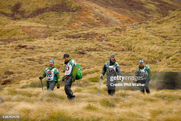 Team Motueka trek in the Red Hills on day two of the GODZone multi day adventure race on April 3, 2016 in Nelson, New Zealand.