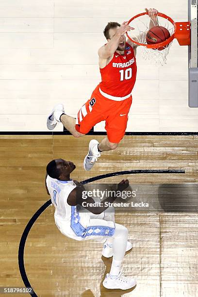 Trevor Cooney of the Syracuse Orange dunks the ball in the second half against the North Carolina Tar Heels during the NCAA Men's Final Four...