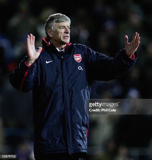 Arsene Wenger, the Arsenal Manager, shouts instructions during the Barclays Premiership match between Portsmouth and Arsenal at Fratton Park on...