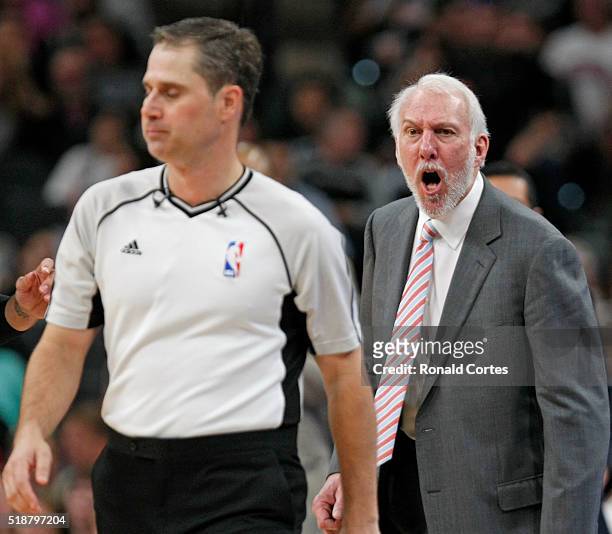 San Antonio Spurs head coach Gregg Popovich yells at David Guthrie after getting a technical during game against Toronto Raptors at AT&T Center on...