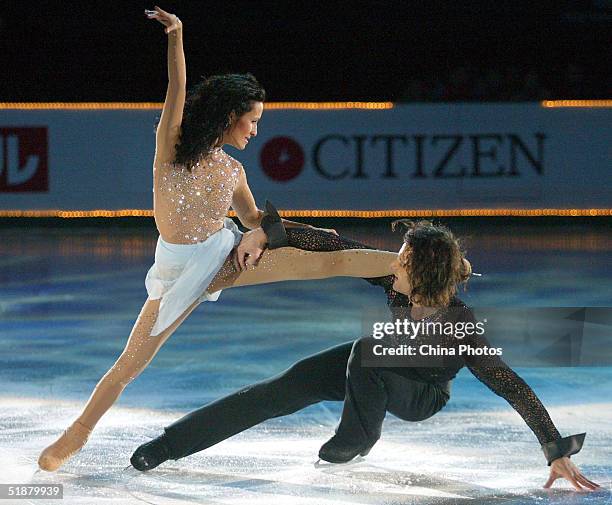 Marie-France Dubreuil and Patrice Lauzon of Canada perform during an Exhibition Program at the 2004/2005 ISU Grand Prix of Figure Skating Final on...