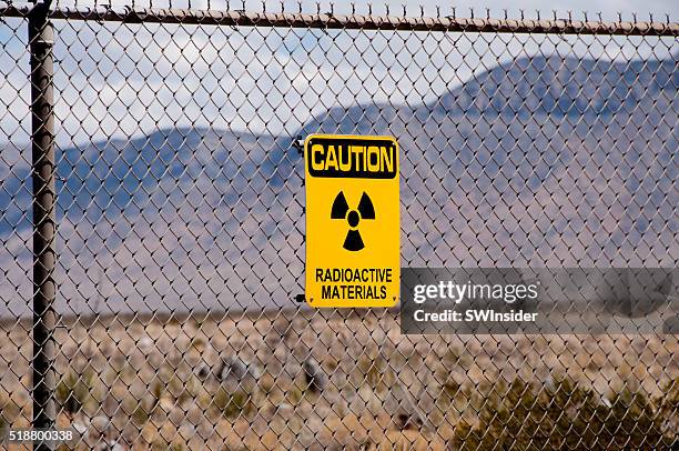 radioactive materials sign at site of first atomic bomb - radiation symbol stock pictures, royalty-free photos & images