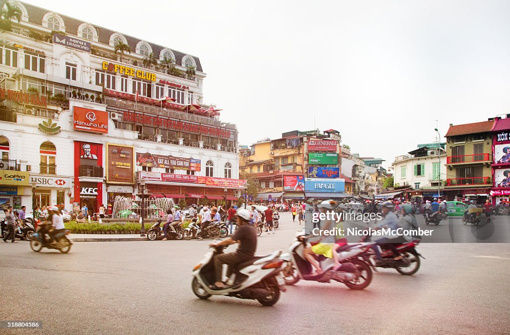 Busy Hanoi Fountain roundabout with traffic