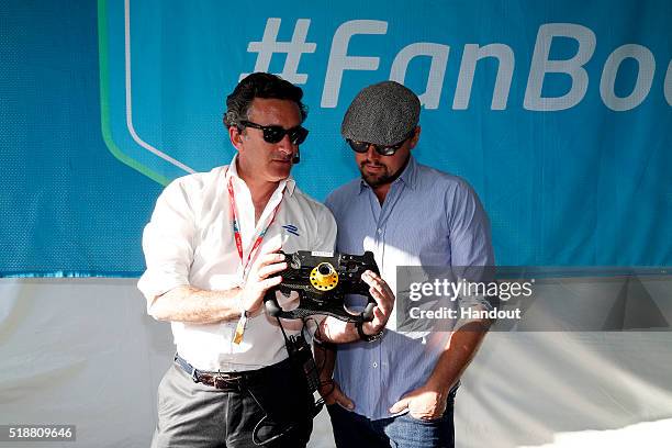 In this handout image supplied by Formula E, Leonardo DiCaprio with Alejandro Agag - CEO, Formula E Holdings during the Long Beach Formula E race at...
