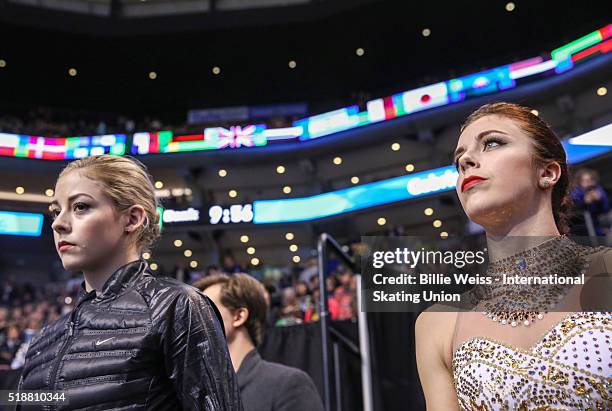 Gracie Gold of the United States and Ashley Wagner of the United States wait to warm up before competing during Day 6 of the ISU World Figure Skating...