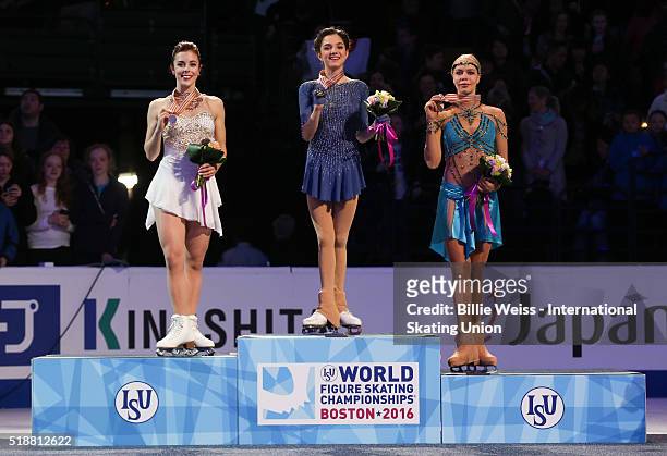 Medal ceremony is held for the ladies free skate with gold medalist Evgenia Madvedeva of Russia, silver medalist Ashley Wagner of the United States,...