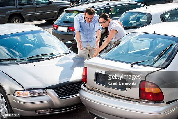 drivers arguing after the accident - crash stock pictures, royalty-free photos & images
