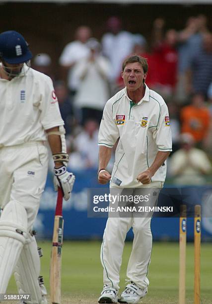 South African bowler Dale Steyn celebrates the wicket of England captain Michael Vaughan for 15 at Saint-George's Park cricket stadium in Port...